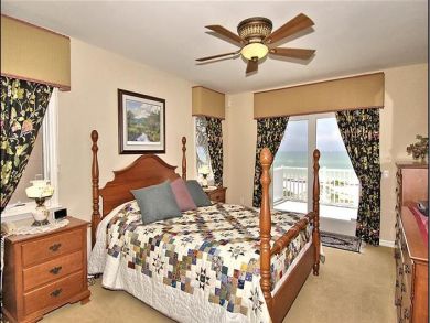 Upstairs master bedroom with queen bed