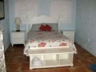 Master bedroom with queen bed