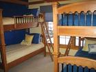 Twin bunk beds in the third bedroom