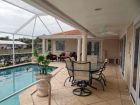 Enjoy relaxing by the pool at your Longboat Key Vacation