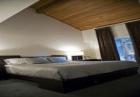 contemporary bed in ski loft accommodation
