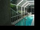 Longboat rental with caged, lap pool